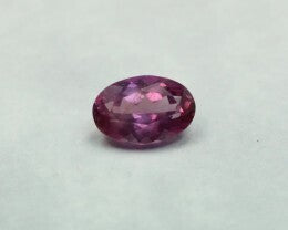 Stunning 0.23 ct Oval Purple-Pink Sapphire